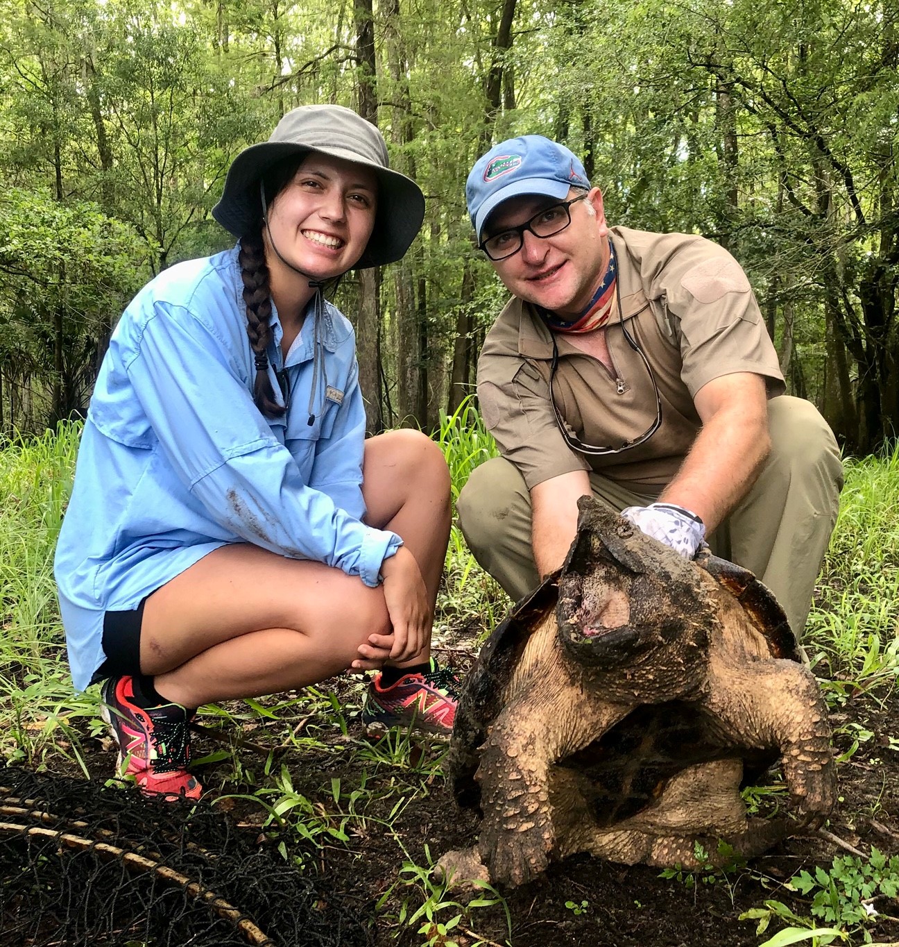 UF/NCBS summer intern Gracie and Dr. Thomas hold an adult female *M. suwanniensis*